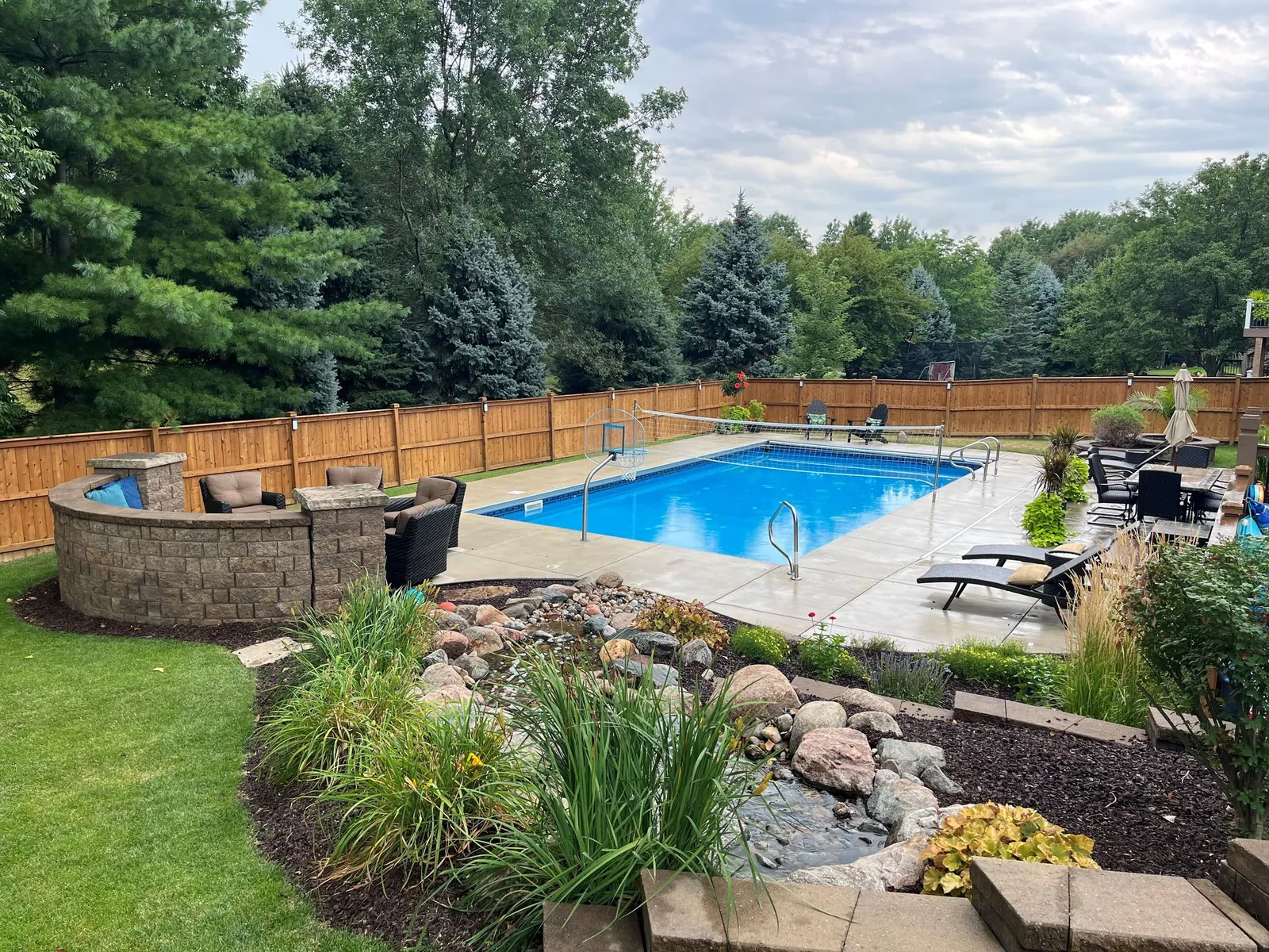 Inground pool in an Omaha backyard serviced by Olympic Pool & Spa
